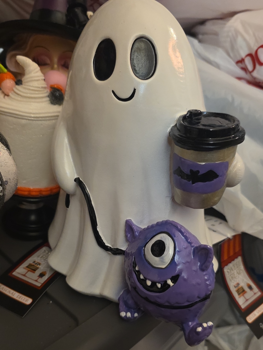 Ghost Figurine with Purple One-Eyed Monster and Coffee Cup